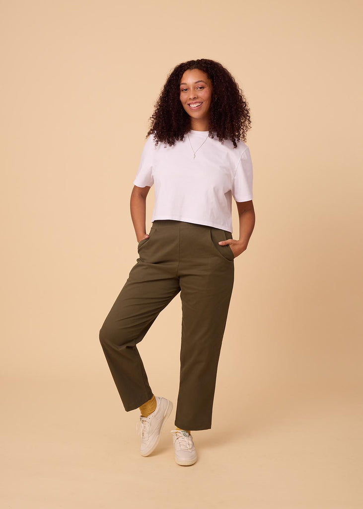 straight size woman wearing olive green straight leg pants