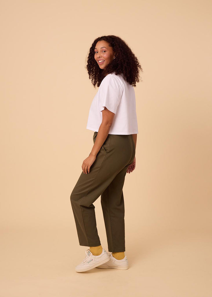 straight size woman wearing olive green straight leg pants