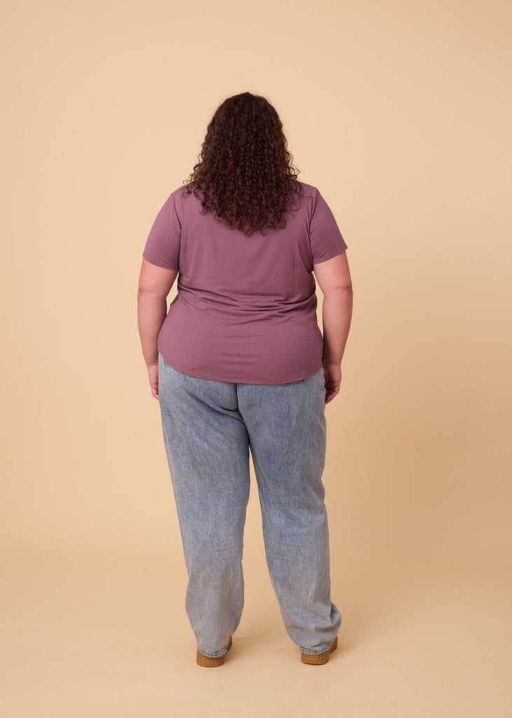  plus size woman in a violet tee shirt