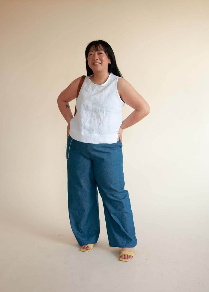 mid size woman wearing wide leg denim pants