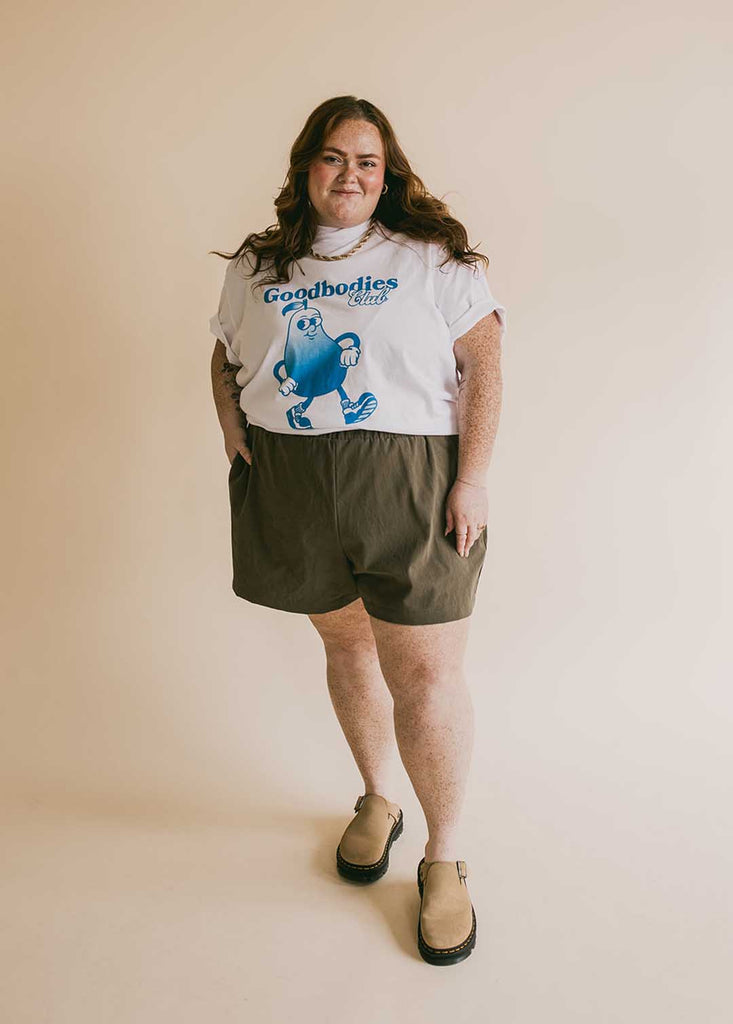 a plus size woman wearing a graphic tee