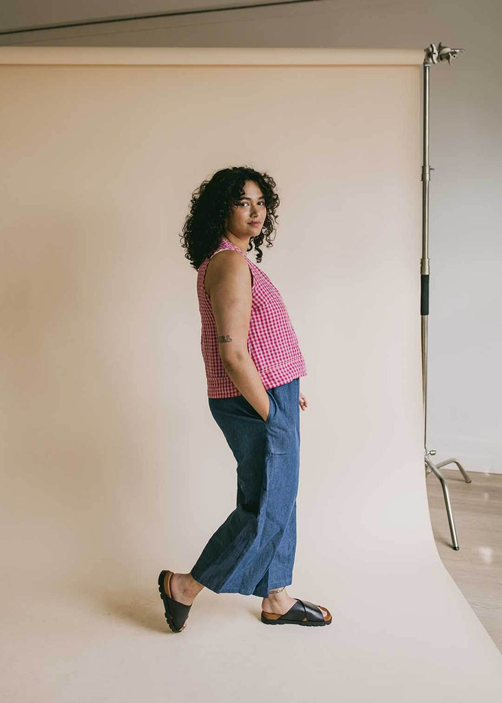 mid size woman wearing wide leg denim pants