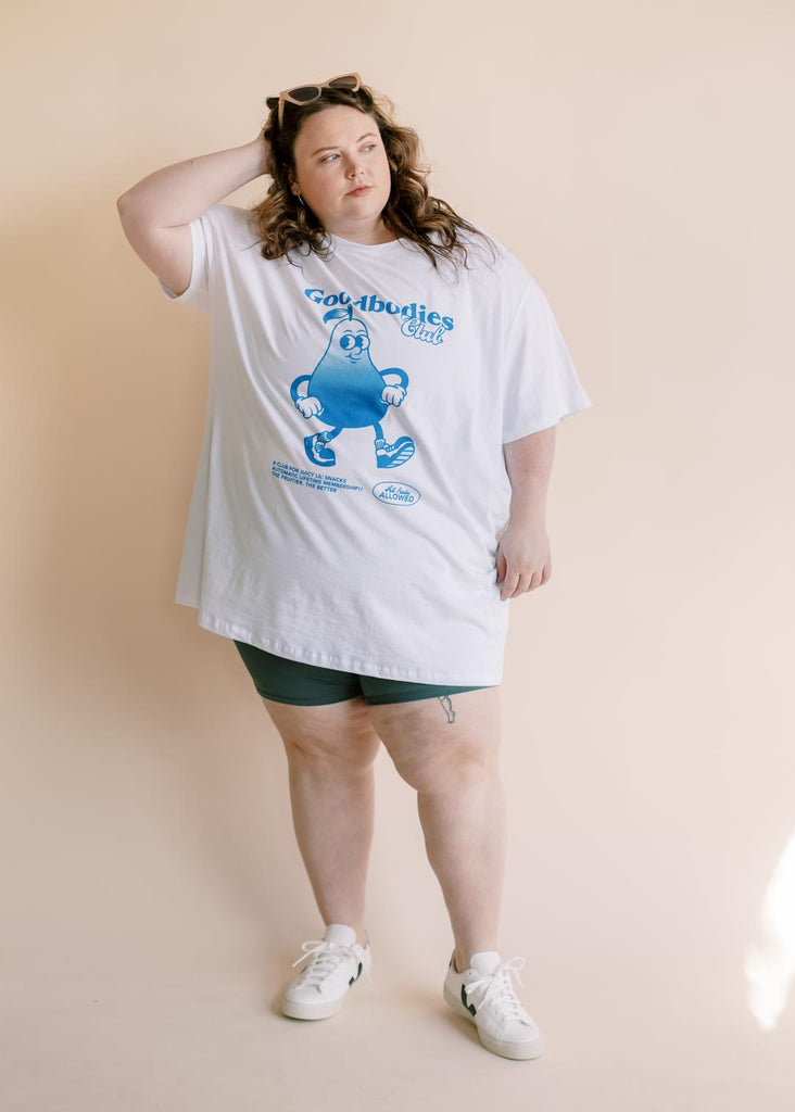 a plus size woman wearing a graphic tee