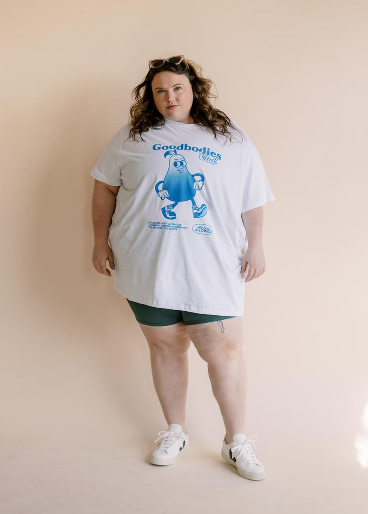 a plus size woman wearing a graphic tee