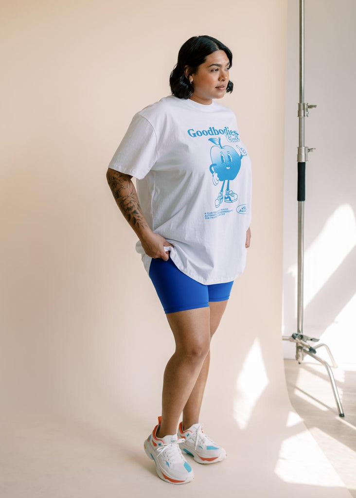 a plus size woman wearing a graphic tee