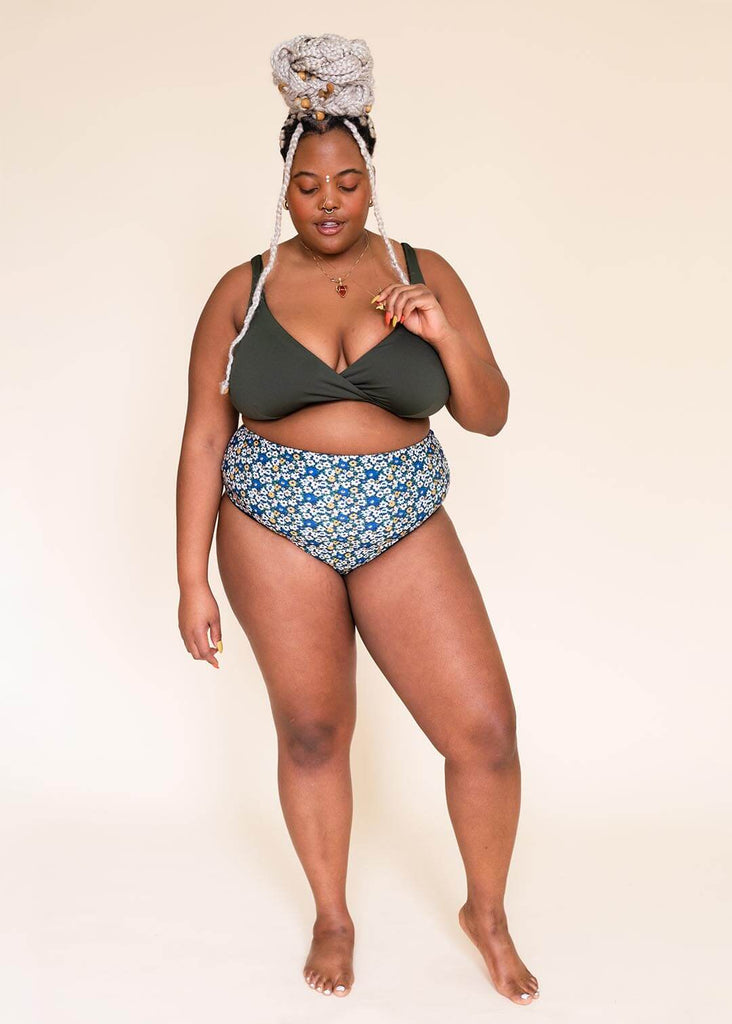 a mid size woman in a mix and match bikini